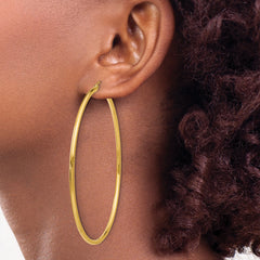 10k Polished 2x65mm Lightweight Tube Hoop Earrings