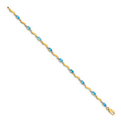 14k Fancy Diamond and Blue Topaz Bracelet