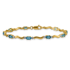 14k Fancy Diamond and Blue Topaz Bracelet