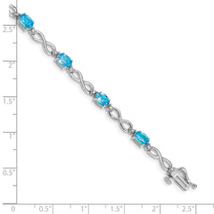 10k White Gold Blue Topaz and Diamond Infinity Bracelet