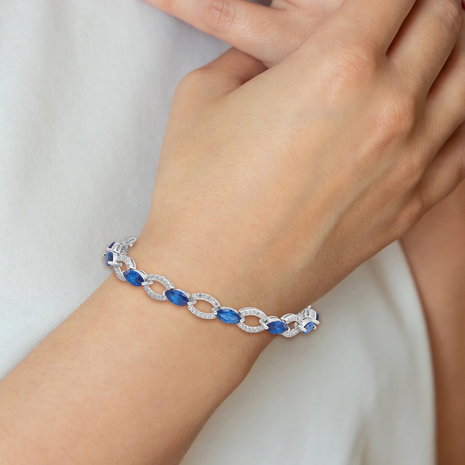 Sterling Silver Rhodium-plated White and Blue CZ Link Bracelet