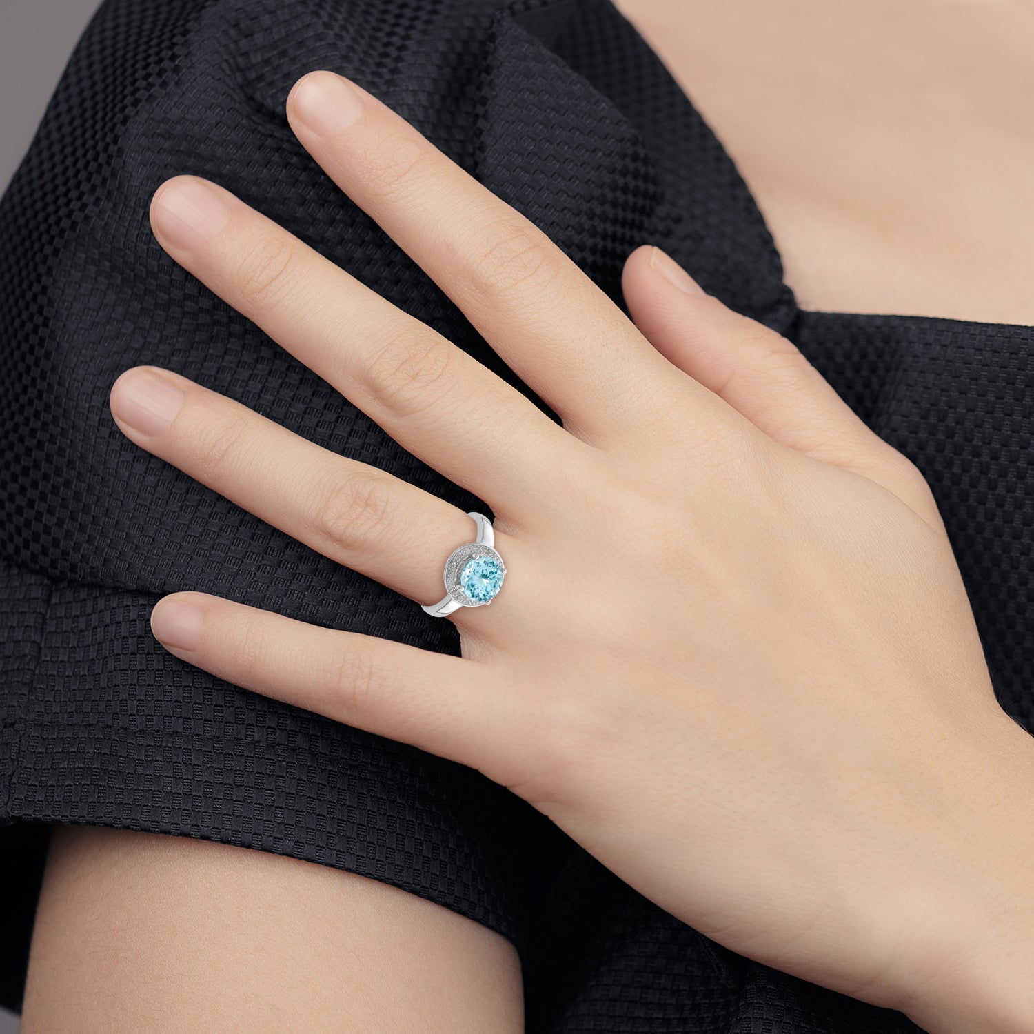 Sterling Silver Rhodium Plated Diamond & Light Swiss Blue Topaz Ring