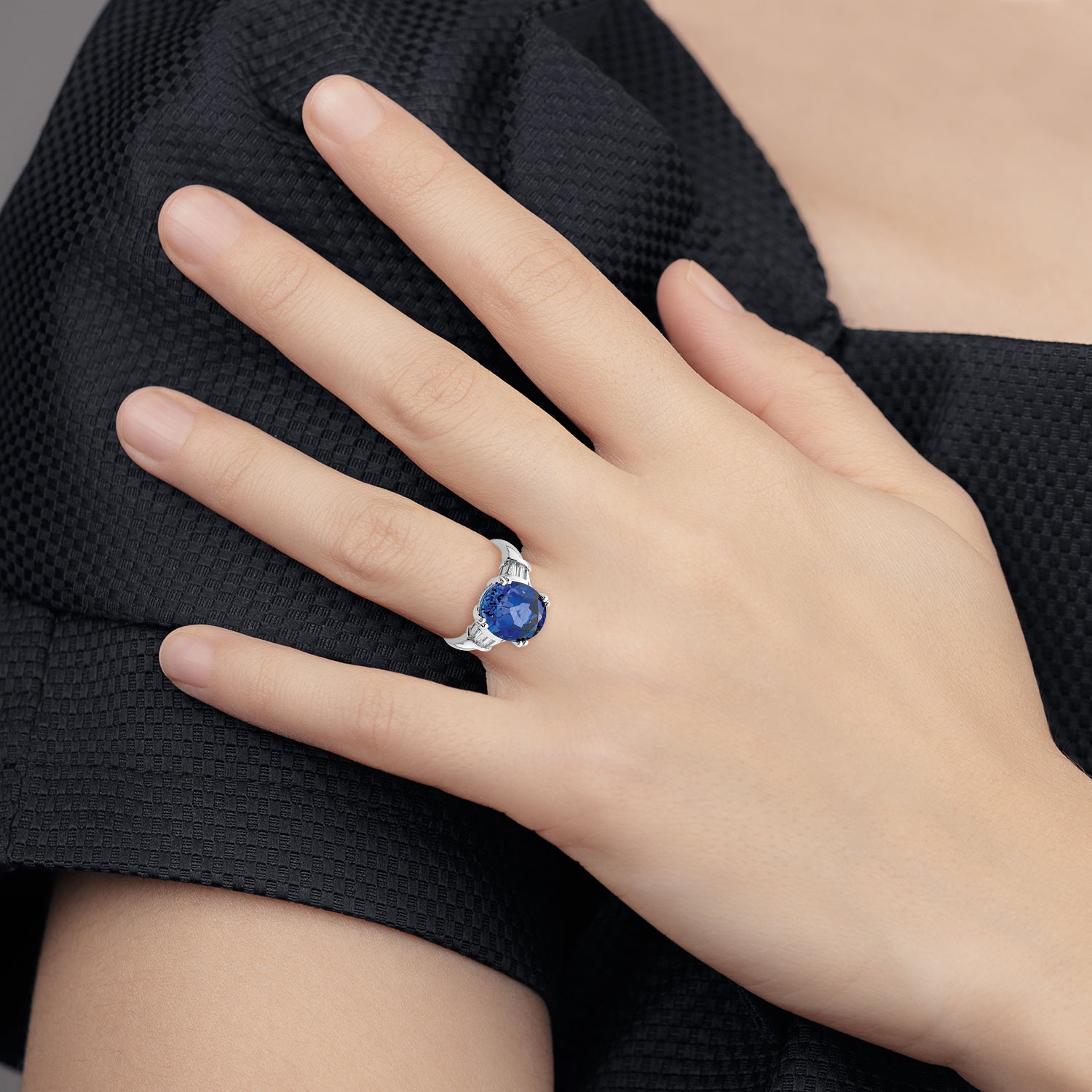 Sterling Silver Rhodium-plated Created Blue Sapphire and CZ Ring