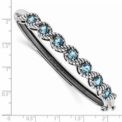 Sterling Silver Rhodium-plated Light Swiss Blue Topaz Hinged Bangle