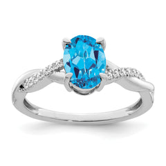 14k White Gold Oval Blue Topaz and Diamond Ring