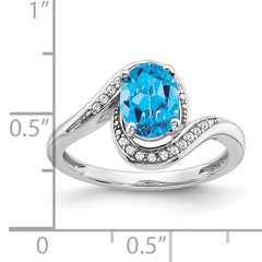 14k White Gold Oval Blue Topaz and Diamond Bypass Ring