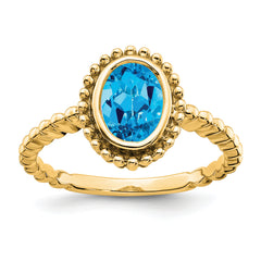 14k Oval Blue Topaz Ring