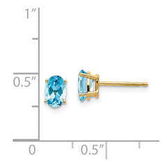 14k 6x4 Oval December/Blue Topaz Post Earrings