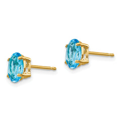 14k 7x5mm Oval Blue Topaz Earrings