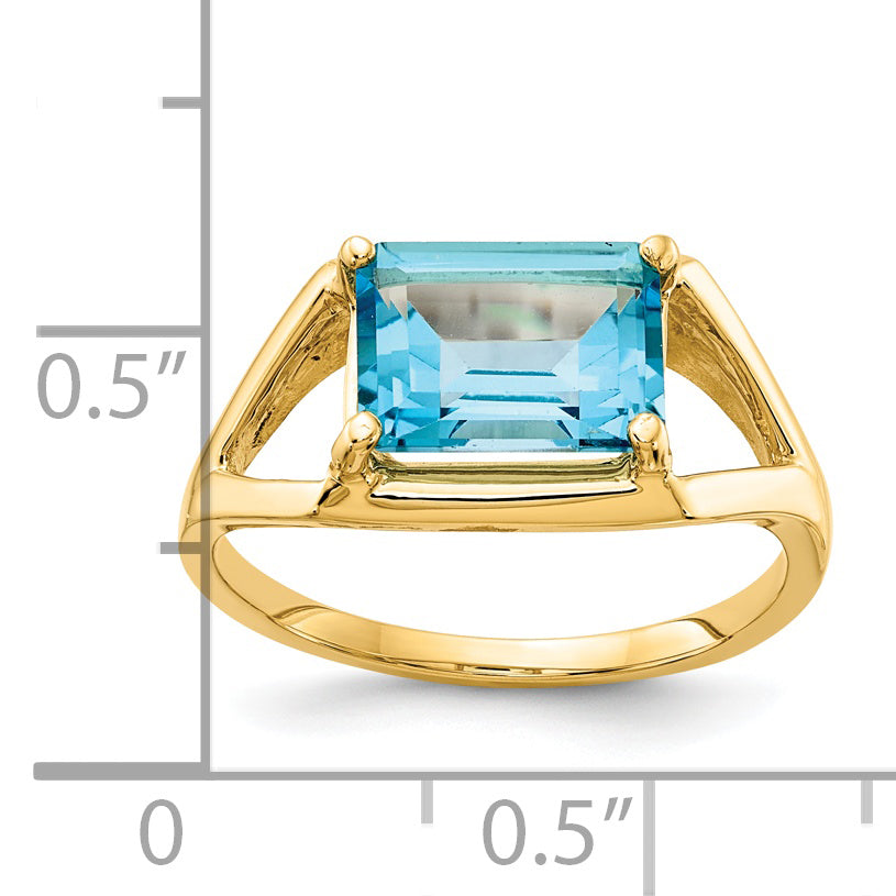 14k 9x7mm Emerald Cut Blue Topaz ring